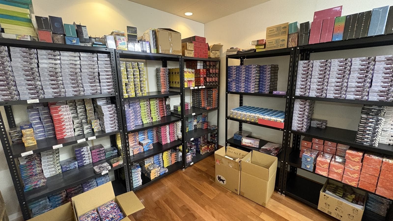 Samurai Card Hub boxes room with sealed box and case inventory shelves