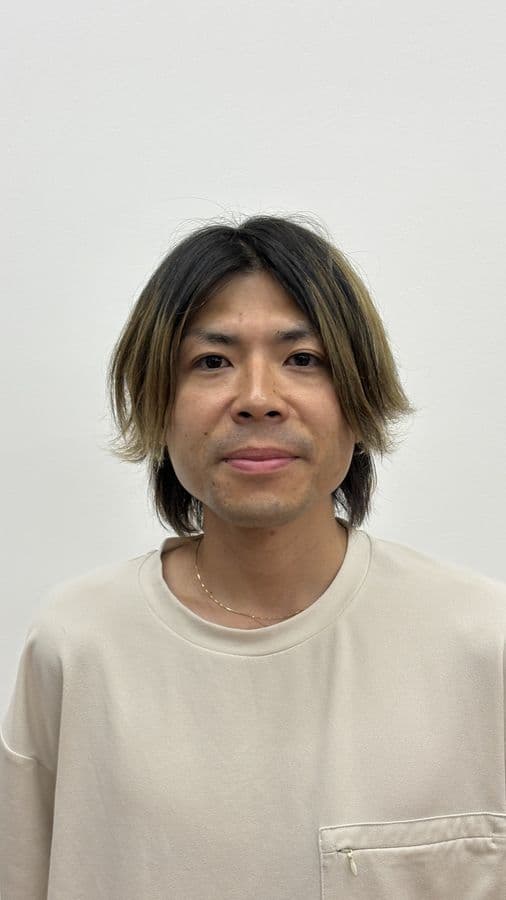 Portrait of Yasuhiro, Store Operations Director at Card Shop
